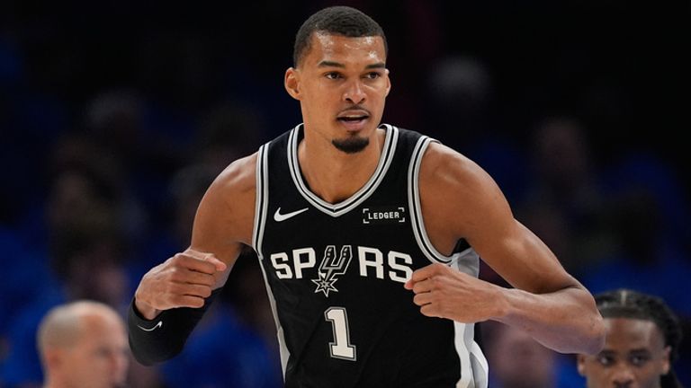San Antonio Spurs forward Victor Wembanyama (1) celebrates after scoring during the second half of Game 1 in a third-round NBA basketball pl