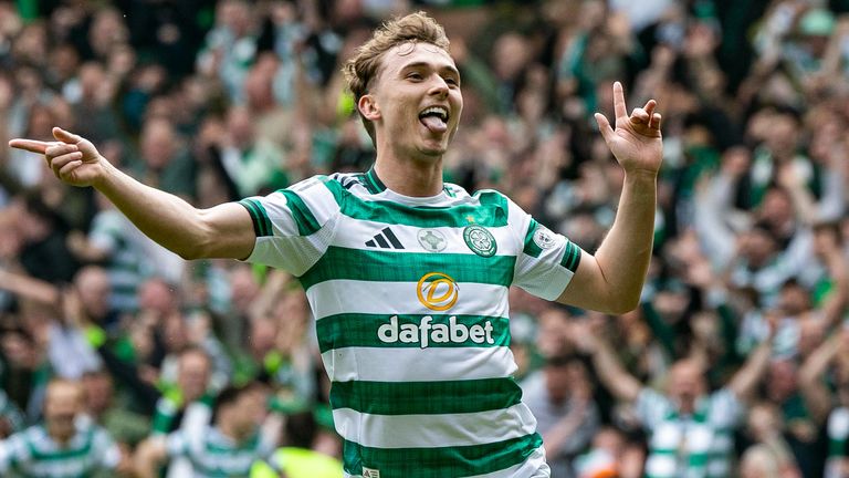 Callum Osmand celebrates after scoring Celtic's third goal against Hearts to seal the Scottish Premiership title
