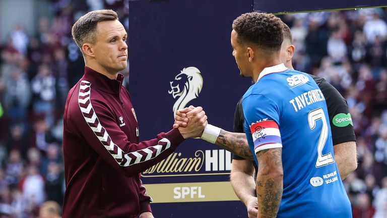 EDINBURGH, SCOTLAND - MAY 04: Hearts captain Lawrence Shankland (L) and Rangers captain James Tavernier shake hands before a William Hill Premiership match between Heart of Midlothian and Rangers at Tynecastle Park, on May 04, 2026, in Edinburgh, Scotland. (Photo by Craig Williamson / SNS Group)