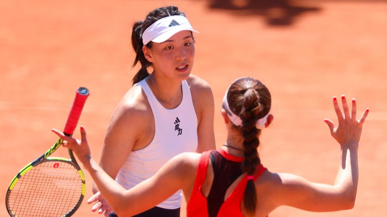 . Korpatsch (Germany) - Wang (China). Xinyu Wang (back) 