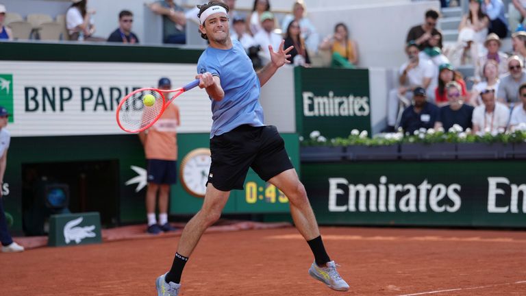Taylor Fritz of the U.S. returns to Nishesh Basavareddy of the U.S. during their first round men's singles tennis match at the French Open t