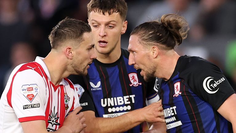 Southampton's Taylor Harwood-Bellis (left) and Middlesbrough's Luke Ayling (right) exchanged words in a fiery first half