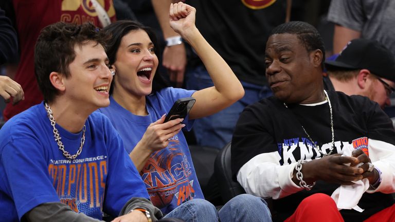 Timoth..e Chalamet, left, Kylie Jenner, center, and Tracy Morgan watch the second half of Game 4 in the Eastern Conference