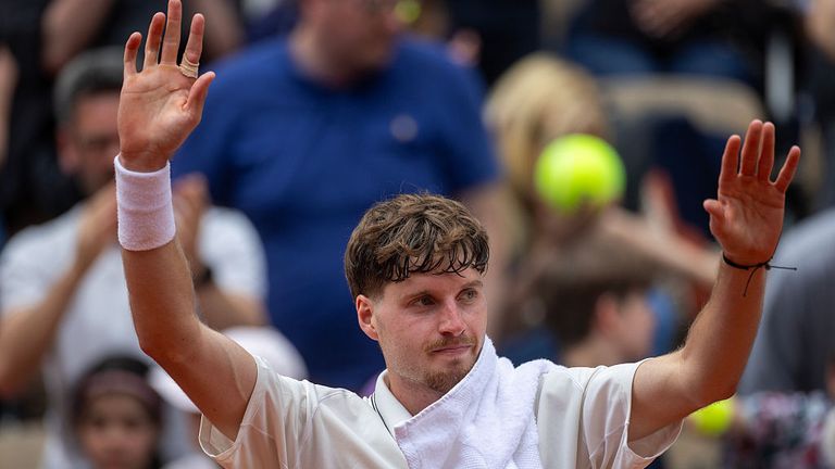 Toby Samuel of Great Britain celebrates after his victory against David Goffin of Belgium on Court Suzanne Lenglen in round two of the Quali