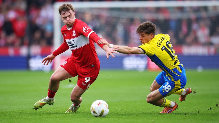 Tommy Conway of Middlesbrough is challenged by Tom Fellows of Southampton