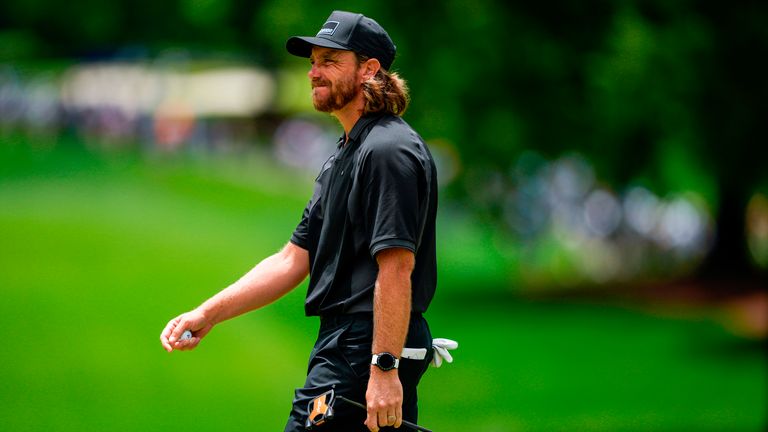Tommy Fleetwood, of England, reacts to a missed putt on the 12th hole during first round of the Truist Championship