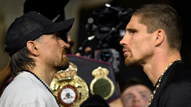 Ukraine's Oleksandr Usyk (L) faces off with Netherlands' Rico Verhoeven during the ceremonial weigh-in ceremony at the Grand Egyptian Museum in Giza on May 22, 2026, on the eve of their WBC World Heavyweight Championship 'Glory in Giza' boxing match in Egypt. (Photo by Khaled DESOUKI / AFP)