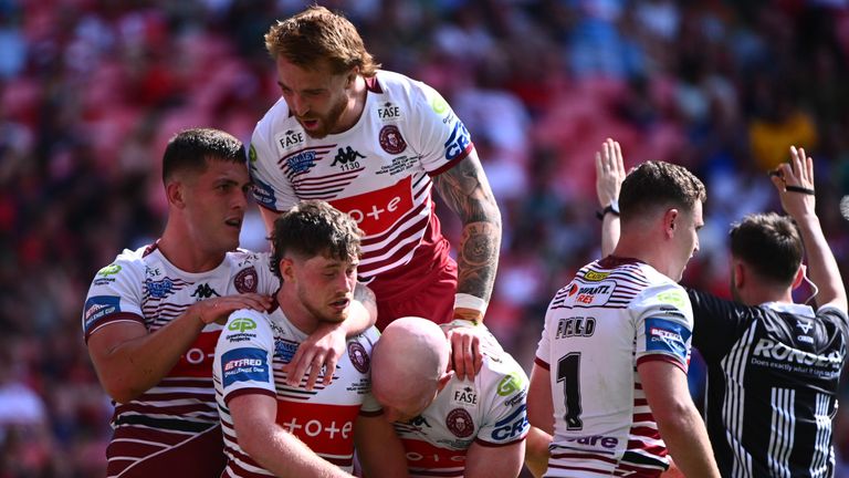Picture by Olly Hassell/SWpix.com - 30/05/2026 - Rugby League - Betfred Challenge Cup Final - Wigan Warriors v Hull KR - Wembley Stadium, London, England - Wigan's Jack Farrimond is congratulated on a try against Hull KR.