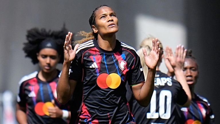 Wendie Renard celebrates after scoring from the penalty spot against Arsenal