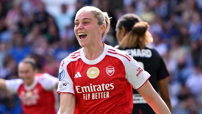 Alessia Russo celebrates after scoring for Arsenal against Lyon