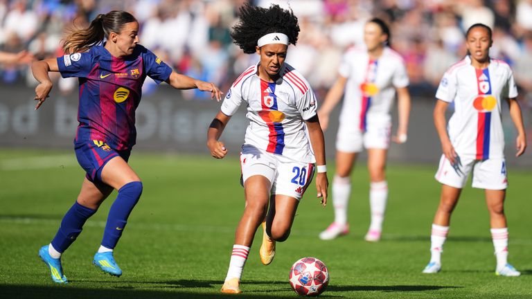 Clara Serrajordi (left) vies for the ball with Lily Yohannes during the Women's Champions League final (AP Photo/Kirsty Wigglesworth)