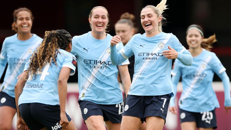Laura Coombs celebrates after scoring Man City's fourth goal at West Ham