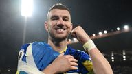 Image of Bosnia and Herzegovina striker and captain Edin Dzeko celebrates after beating Italy to qualify for the 2026 World Cup