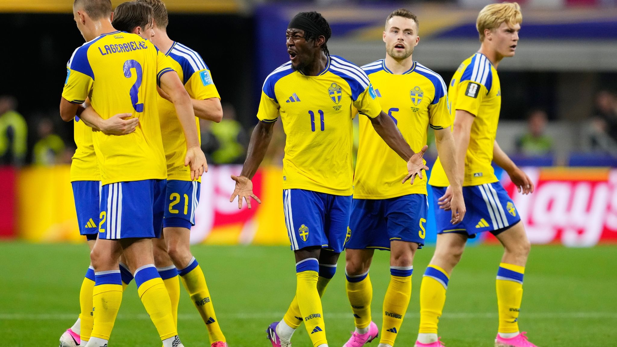 Sweden players celebrate Anthony Elanga equalizer