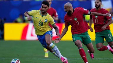 Brazil's Lucas Paqueta, left, and Morocco's Noussair Mazraoui compete for the ball during the World Cup Group C soccer match between Brazil and Morocco in East Rutherford, N.J., near New York, Saturday, June 13, 2026. (AP Photo/Petr David Josek)