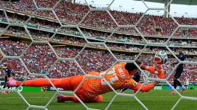 Uruguay goalkeeper Fernando Muslera is beaten by a shot from Spain's Alex Baena at the World Cup