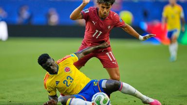 João Felix (11) and Davinson Sanchez (23) from Portugal battle for the ball