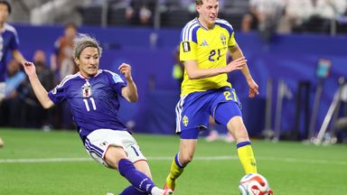 Japan's Daizen Maeda (11) scores his team's first goal