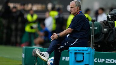 Uruguay head coach Marcelo Bielsa sits on a cooler during the World Cup Group H soccer match between Uruguay and Spain