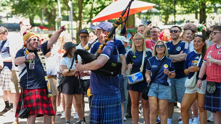Scottish fans celebrate at a park in central Boston ahead of the World Cup match against Haiti. Pic: AP Photo/Martin Meissner