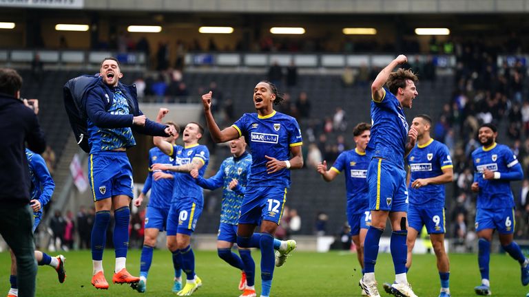 AFC Wimbledon celebrate victory over MK Dons in 2024