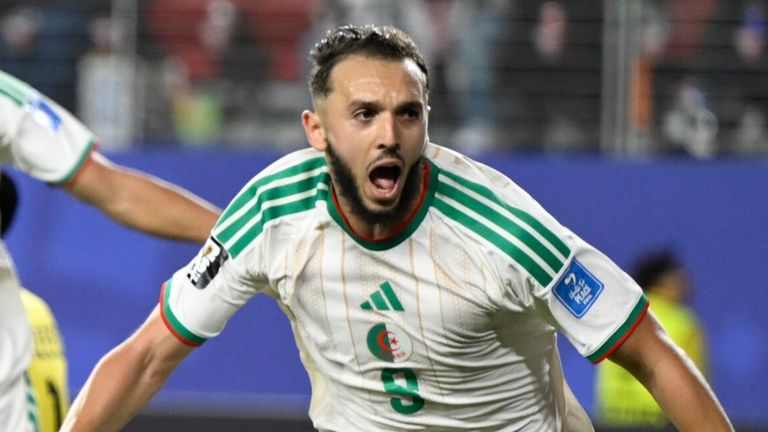 Algeria's Amine Gouiri, front, celebrates after scoring his side's second goal against Jordan during the World Cup Group J