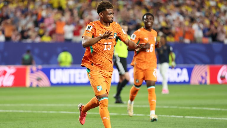 Amad Diallo celebrates his goal for Ivory Coast against Ecuador at the World Cup