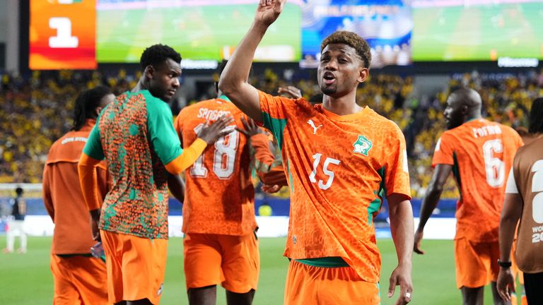 Ivory Coast's Amad Diallo gestures to fans after scoring his team's first goal during the World Cup Group E soccer match against Ecuador