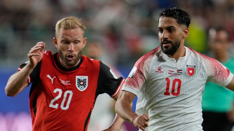 Jordan's Mousa Altamari (10) battles for the ball with Austria's Konrad Laimer (20) during the World Cup Group J match
