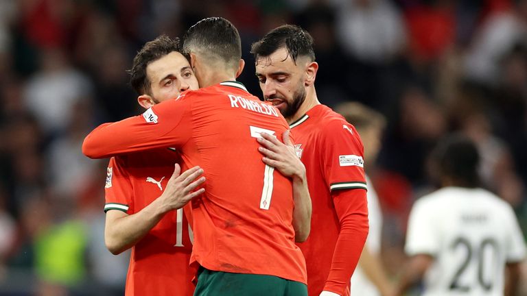 Bernardo Silva, Cristiano Ronaldo and Bruno Fernandes celebrate after a goal for Portugal against Germany at the 2025 Nations League Finals