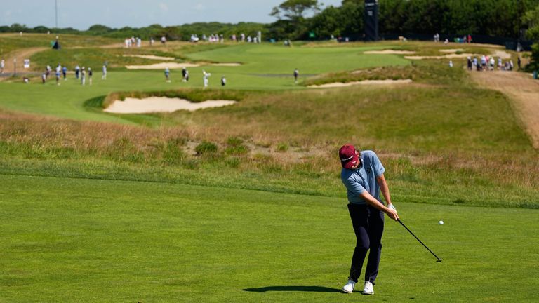 Cameron Smith, of Australia, chips to the green on the 11th hole during a practice round for the U.S. Open 