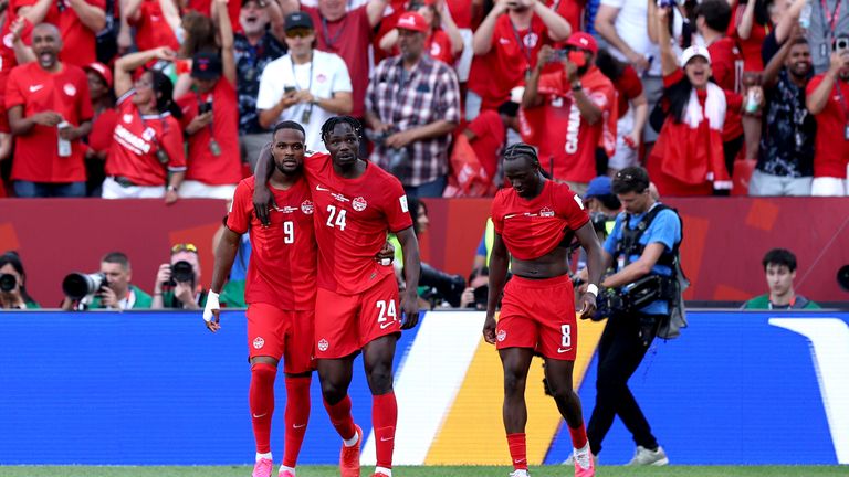 Cyle Larin celebrates his equaliser for Canada