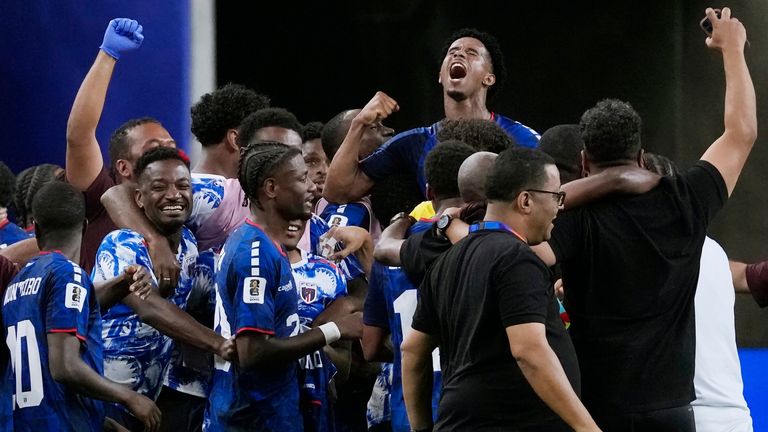 Cape Verde celebrate after reaching the round of 32 following a goalless draw with Saudi Arabia