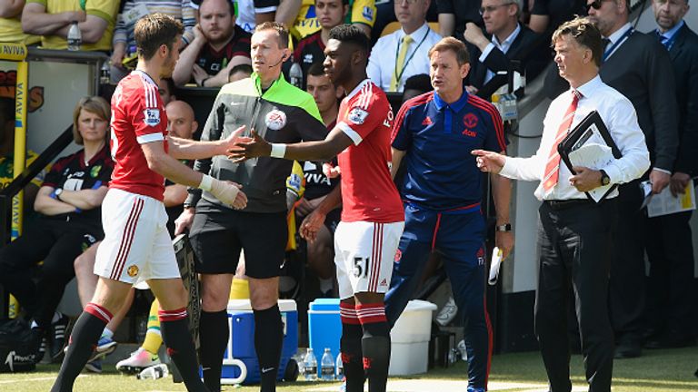 NORWICH, ENGLAND - MAY 07:  Manchester United manager Louis van Gaal brings on Timothy Fosu-Mensah for Michael Carrick during the Barclays Premier League match between Norwich City and Manchester United at Carrow Road on May 07, 2016 in Norwich, England.  (Photo by Mike Hewitt/Getty Images)