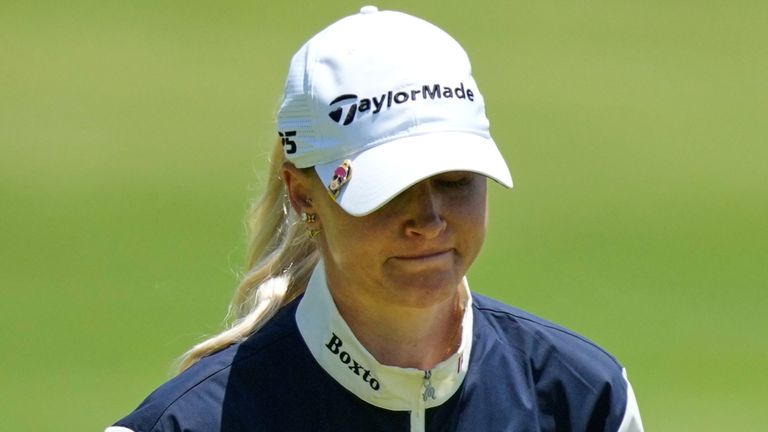 Charlie Hull, of England, reacts to her putt on the second green during the final round of the US Women's Open golf tournament.