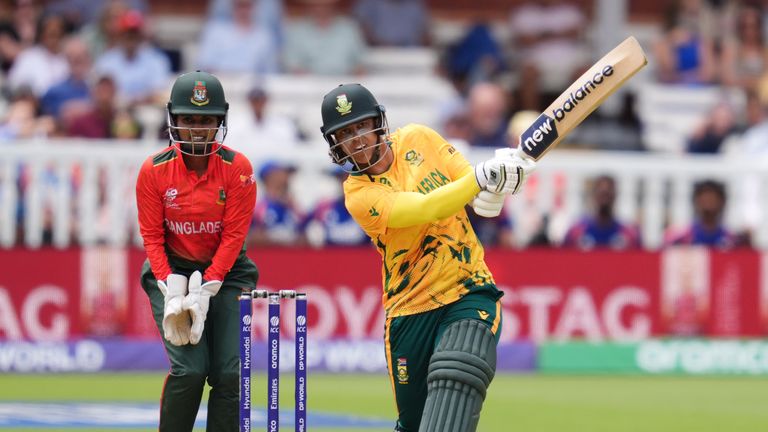 South Africa's Chloe Tryon hits the winning run to beat Bangladesh.