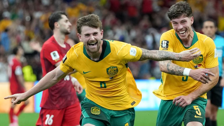Australia's Connor Metcalfe celebrates with Jordan Bos after scoring the second goal against Turkey (AP Photo/Abbie Parr)