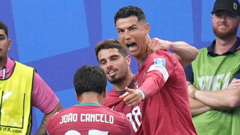 Portugal's Cristiano Ronaldo (7) celebrates with teammates after scoring his side's third goal during the World Cup Group K soccer match between Portugal and Uzbekistan in Houston, Tuesday, June 23, 2026. (AP Photo/Eric Gay)