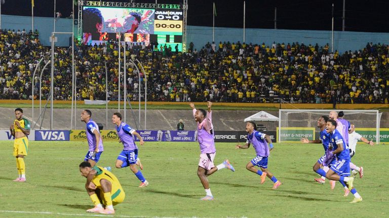 Cura..ao players celebrate qualifying for the 2026 FIFA World Cup after a soccer match against Jamaica in Kingston, Jamaica, Tuesday, Nov. 18, 2025. (AP Photo/Collin Reid)