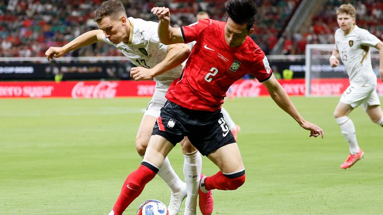 Czech Republic's midfielder Lukas Provod and South Korea's defender Lee Han-beom fight for the ball during the 2026 World Cup