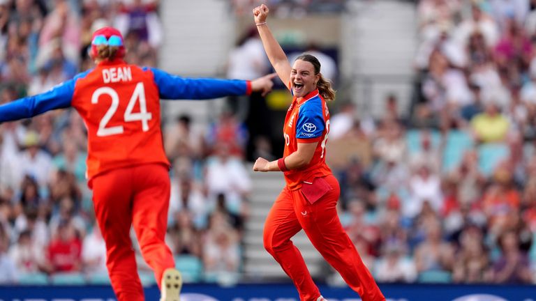 England's Dani Gibson (right) celebrates after taking the wicket of New Zealand's Izzy Sharp (not pictured) during the ICC Women's T20 World