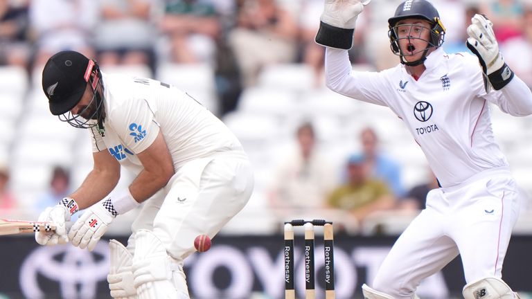 New Zealand's Daryl Mitchell deals with unpredictable bounce on the fourth morning at Trent Bridge