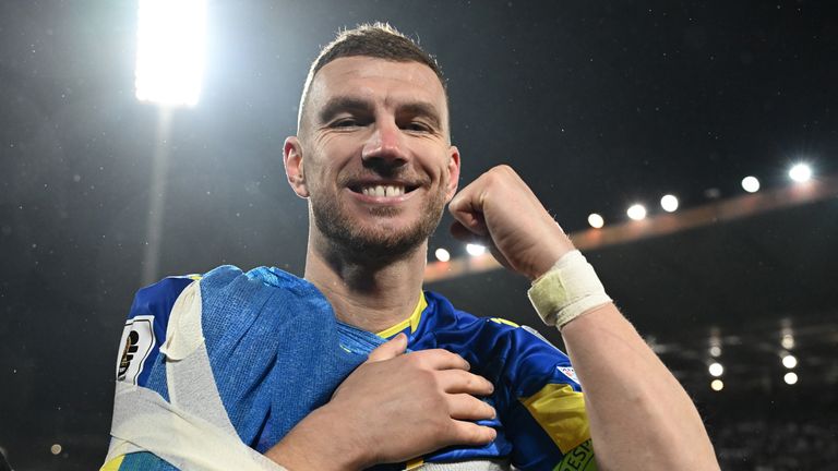 Bosnia and Herzegovina striker and captain Edin Dzeko celebrates after beating Italy to qualify for the 2026 World Cup