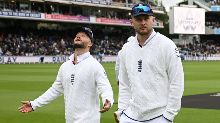 England's Ben Duckett and Gus Atkinson walk off as rain stops day three of the first Test against New Zealand at Lord's (Getty Images)