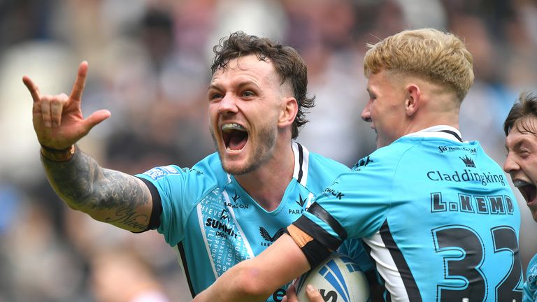 Ethan O'Neill celebrates the second of his two tries in Hull FC's Super League win over Huddersfield Giants