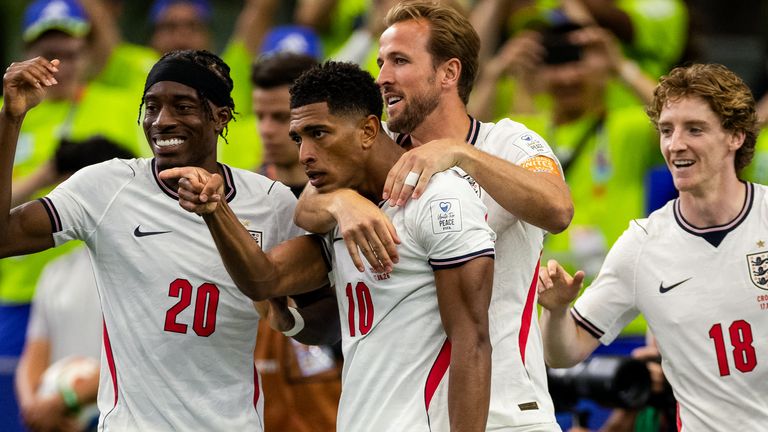 Jude Bellingham celebrates with Noni Madueke, Harry Kane and Anthony Gordon after scoring England's third goal