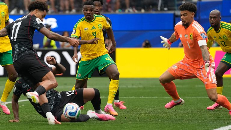 Canada's Tajon Buchanan shoots against South Africa