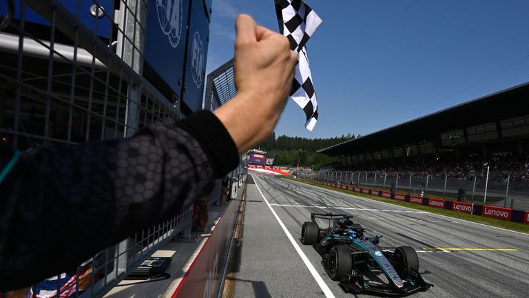 Mercedes driver George Russell of Britain crosses the finish line to win the Austrian F1 Grand Prix, in Spielberg, Austria, Sunday, June 28, 2026. (AP Photo/Denes Erdos,Pool)