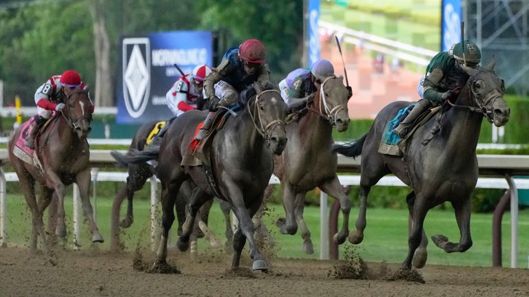 Golden Tempo (9) with Jockey Jose Ortiz win the 158th running of the Belmont Stakes horse race, Saturday.Y. (AP Photo/Yuki Iwamura)