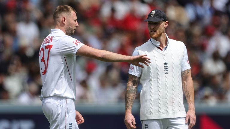 England captain Ben Stokes and fast bowler Gus Atkinson in conversation during the first Test against New Zealand